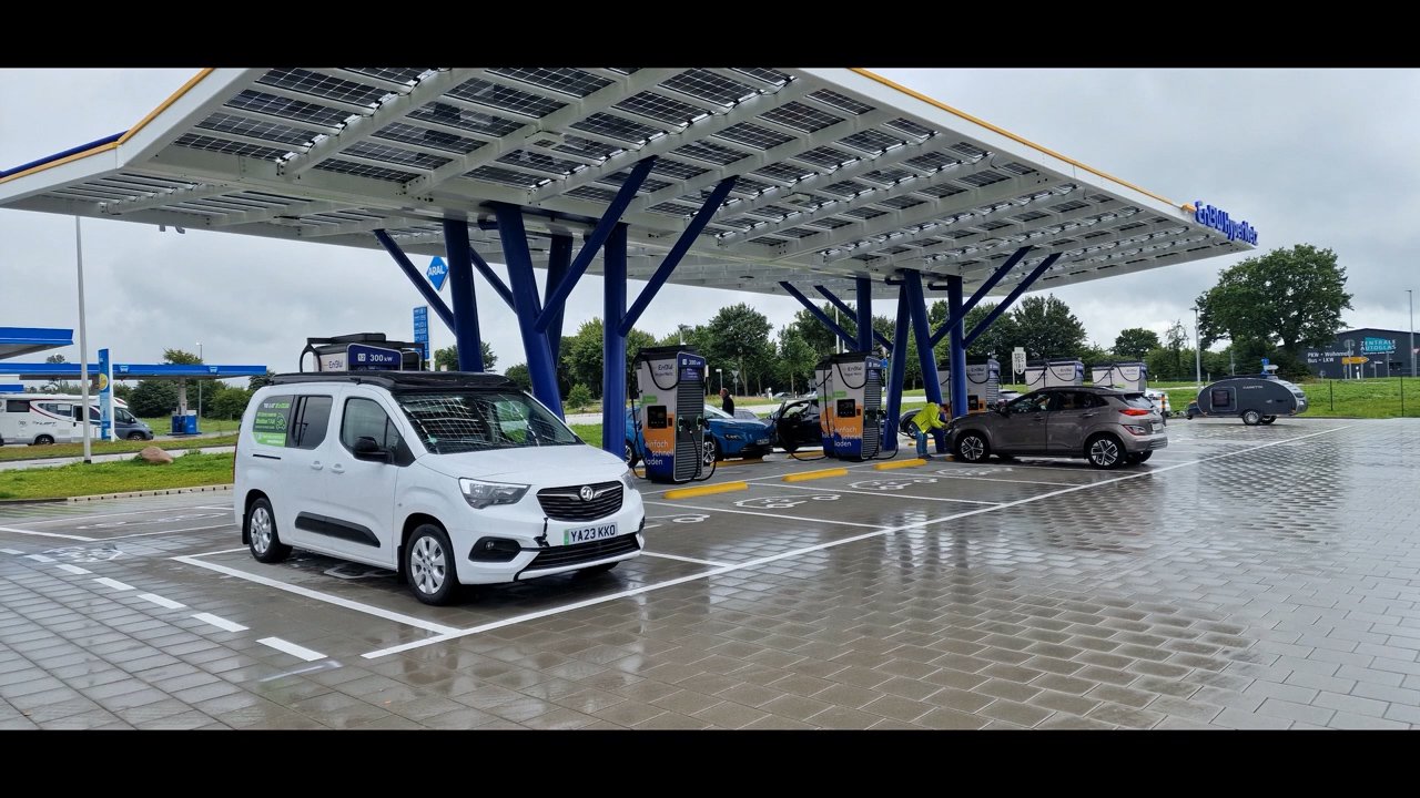 Charging en route to Hirtshals at a modern solar-canopied station in Germany