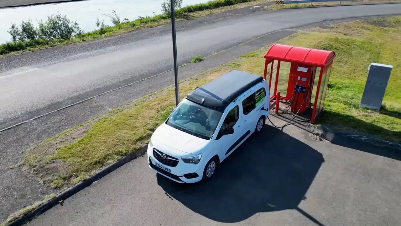 Topping up at one of Iceland&rsquo;s chargers, the solar panel visible on the roof