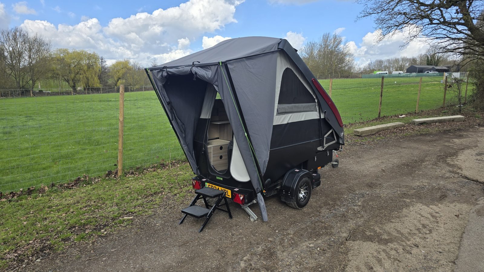 ECTS set up with awning used as a porch