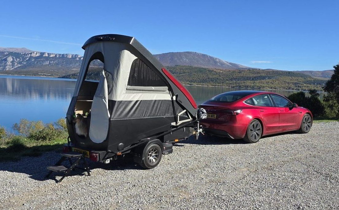 Dashaway ECT2 by a lakeside with mountain backdrop